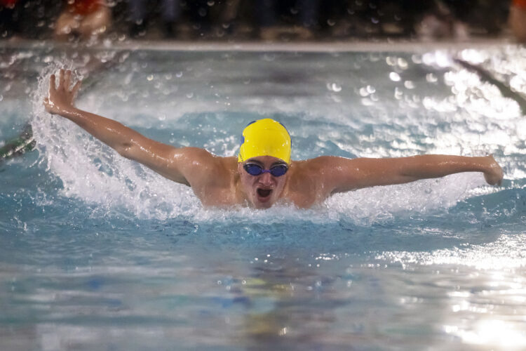 Kingsford’s returning swim champs earn victories against Houghton